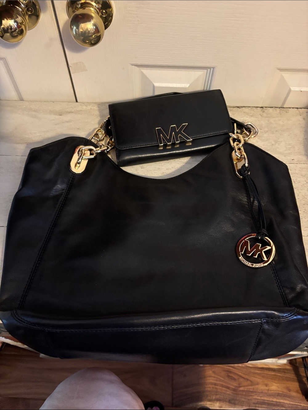 Michael Kors Black Leather Shoulder Bag with Gold Hardware and MK Charm
